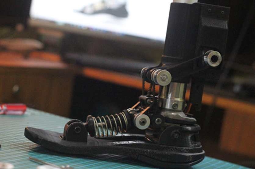 Close-up of the prosthetic ankle and foot mechanism