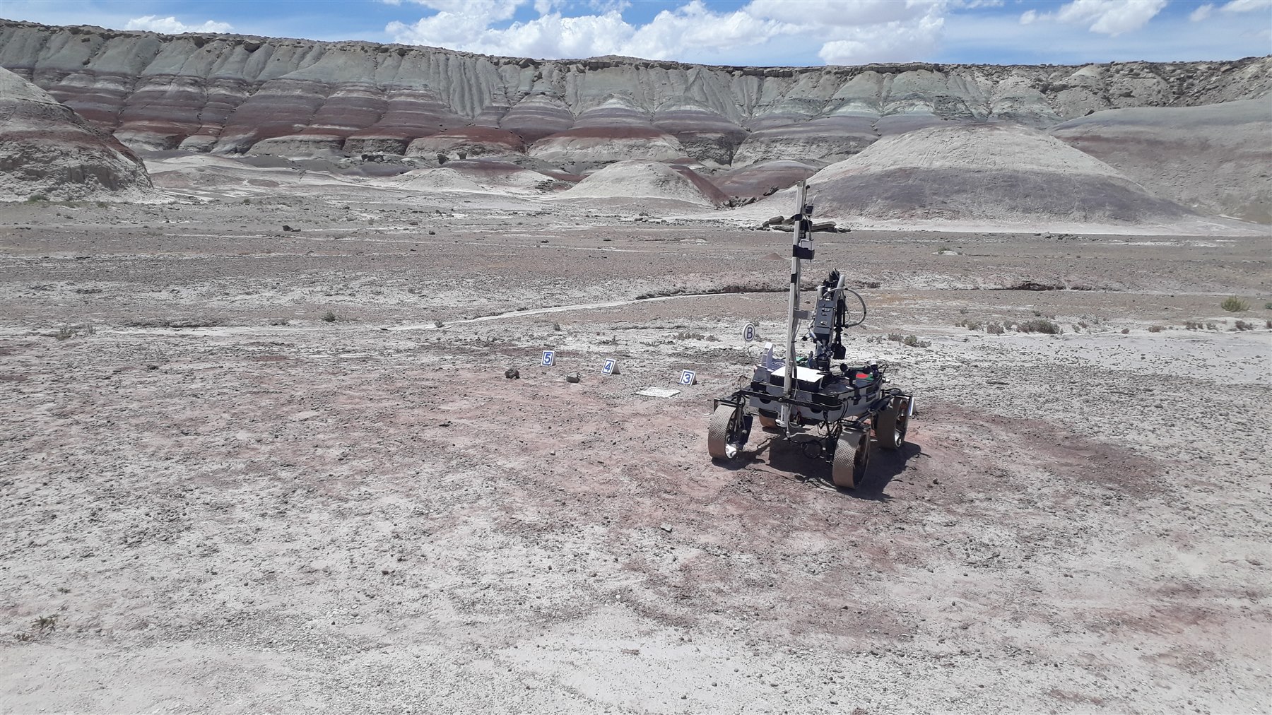 Mongol Tori rover on rocky outdoor terrain