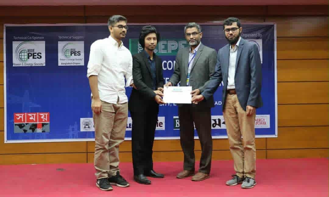 Participants receiving a certificate on stage